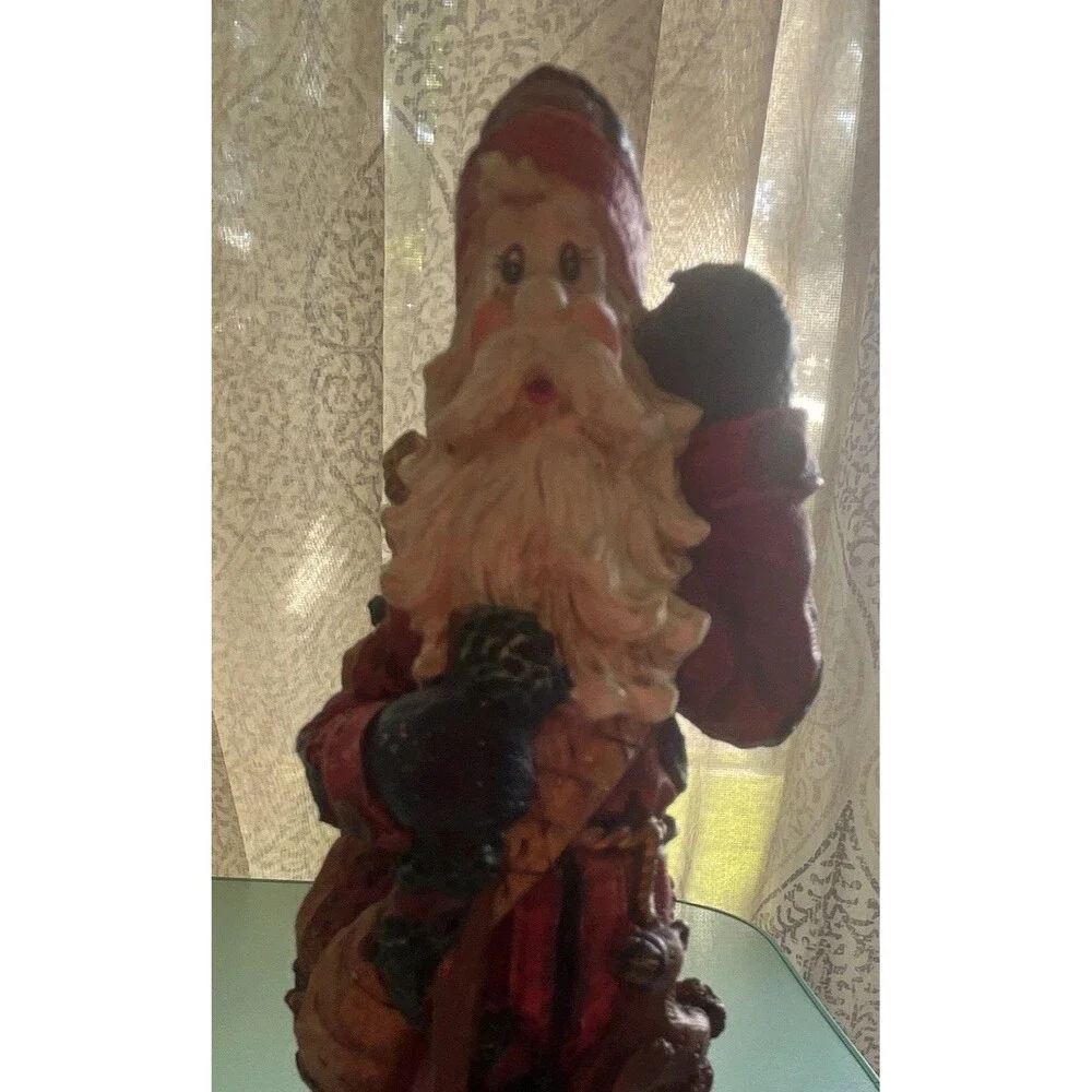 Vintage rustic, resin pencil Santa with toy bag